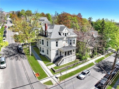 5 STAR 5 UNIT 5 MINUTES TO CORNELL! Impressive architectural - photo 4