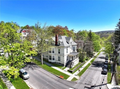 5 STAR 5 UNIT 5 MINUTES TO CORNELL! Impressive architectural - photo 5