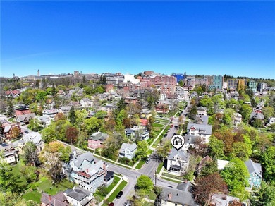 5 STAR 5 UNIT 5 MINUTES TO CORNELL! Impressive architectural - photo 8