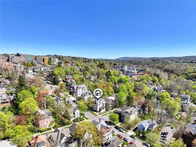 5 STAR 5 UNIT 5 MINUTES TO CORNELL! Impressive architectural - photo 9