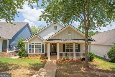 Welcome home to this charming 3-bedroom, 2-bath ranch in the - photo 1