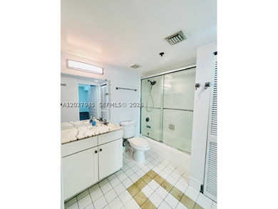 Perched on the PH floor of The Club at Brickell Bay, this - photo 22