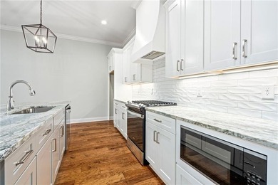 Welcome to easy, low-maintenance living in Windsor Village, one - photo 3