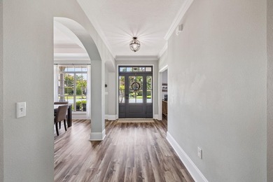 Love to entertain? This beautifully updated home in the gated - photo 5