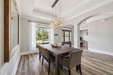 Love to entertain? This beautifully updated home in the gated - photo 6
