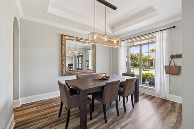 Love to entertain? This beautifully updated home in the gated - photo 7