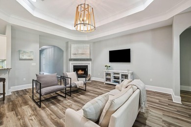 Love to entertain? This beautifully updated home in the gated - photo 9