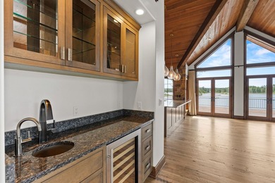 Set on a spectacular peninsula on Echo Lake, this beautifully - photo 12