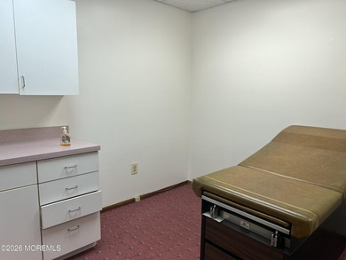 Available a one-story end unit office condo. The unit features - photo 13