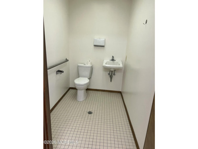 Available a one-story end unit office condo. The unit features - photo 14