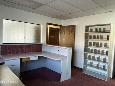 Available a one-story end unit office condo. The unit features - photo 16