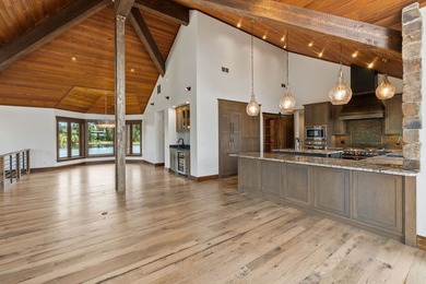 Set on a spectacular peninsula on Echo Lake, this beautifully - photo 18