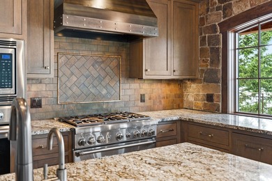 Set on a spectacular peninsula on Echo Lake, this beautifully - photo 19