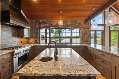 Set on a spectacular peninsula on Echo Lake, this beautifully - photo 20
