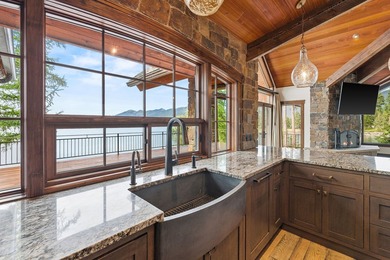 Set on a spectacular peninsula on Echo Lake, this beautifully - photo 21
