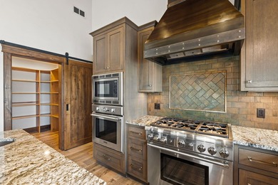 Set on a spectacular peninsula on Echo Lake, this beautifully - photo 23