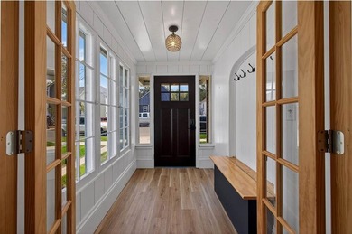 Freshly renovated and full of opportunity, this rare property on - photo 1
