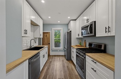 Freshly renovated and full of opportunity, this rare property on - photo 6