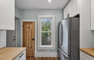 Freshly renovated and full of opportunity, this rare property on - photo 7