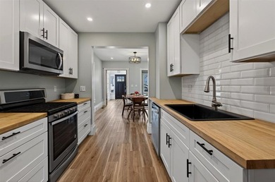 Freshly renovated and full of opportunity, this rare property on - photo 9