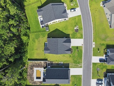 Built in 2024 on a private, wooded homesite with natural - photo 41