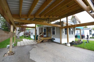 Experience the charm of Lakeview Village in Boyne City, where - photo 2