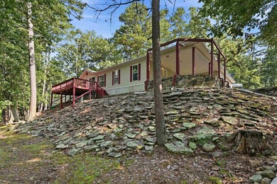 Bring your vision to this Greers Ferry Lake home on the - photo 14