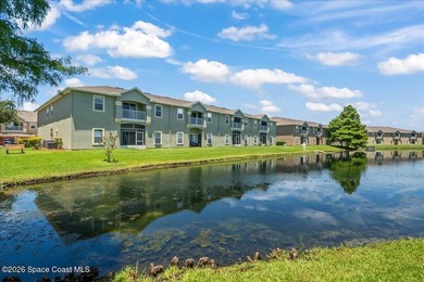 Rarely available in gated Jameson Place, this second-floor - photo 1