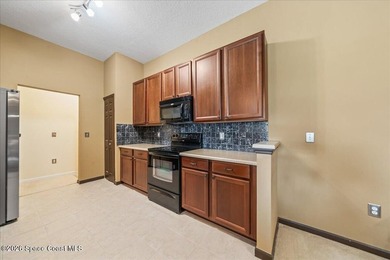 Rarely available in gated Jameson Place, this second-floor - photo 9