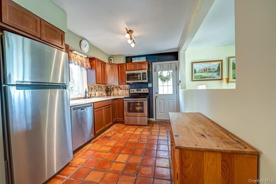 This Nantucket Cape boasts beautiful waterviews overlooking - photo 11