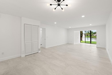 Stunning renovated downstairs 2/2 condo overlooking a beautiful - photo 12