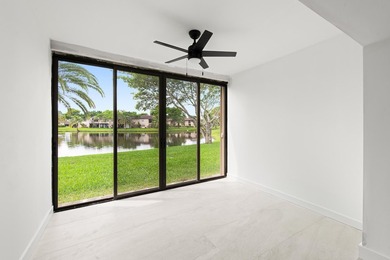 Stunning renovated downstairs 2/2 condo overlooking a beautiful - photo 15
