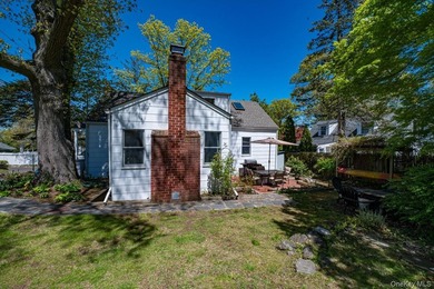 This Nantucket Cape boasts beautiful waterviews overlooking - photo 26