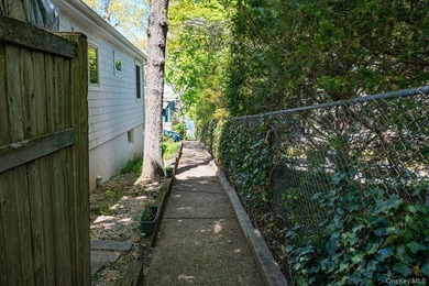 This Nantucket Cape boasts beautiful waterviews overlooking - photo 34