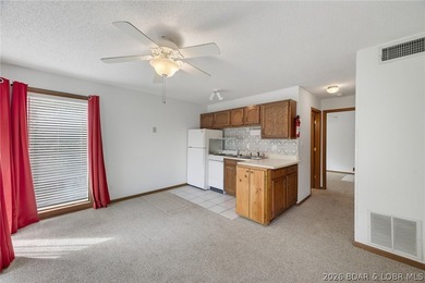 AFFORDABLE LAKEFRONT, Low HOA fees, 1 bedroom, 1 bath end-unit - photo 12