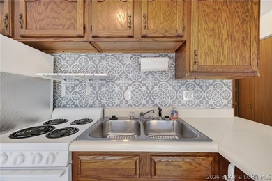 AFFORDABLE LAKEFRONT, Low HOA fees, 1 bedroom, 1 bath end-unit - photo 15