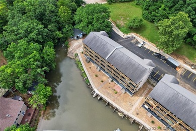 AFFORDABLE LAKEFRONT, Low HOA fees, 1 bedroom, 1 bath end-unit - photo 25