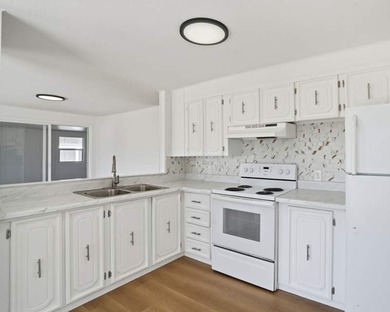 This 1200 square feet, 2.0 bed 2.0 bath located in the - photo 6