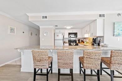 Beachfront living meets fresh coastal style in this updated - photo 8