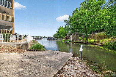 AFFORDABLE LAKEFRONT, Low HOA fees, 1 bedroom, 1 bath end-unit - photo 31