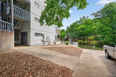 AFFORDABLE LAKEFRONT, Low HOA fees, 1 bedroom, 1 bath end-unit - photo 32