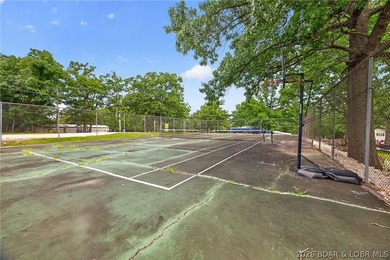 AFFORDABLE LAKEFRONT, Low HOA fees, 1 bedroom, 1 bath end-unit - photo 35