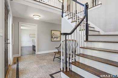 Beautifully sited on a fabulous private lot in the highly - photo 2