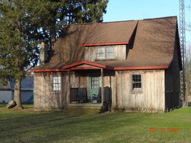 (private lake, pond, creek) Home Sale Pending in White Cloud Michigan
