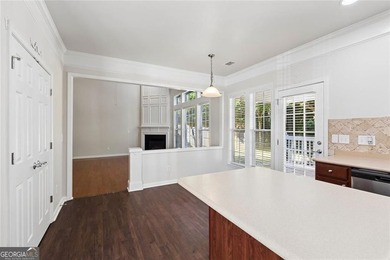 Two-story home featuring an open, light-filled floor plan with - photo 6