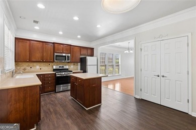 Two-story home featuring an open, light-filled floor plan with - photo 8