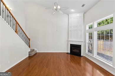 Two-story home featuring an open, light-filled floor plan with - photo 9
