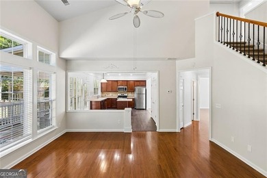 Two-story home featuring an open, light-filled floor plan with - photo 10