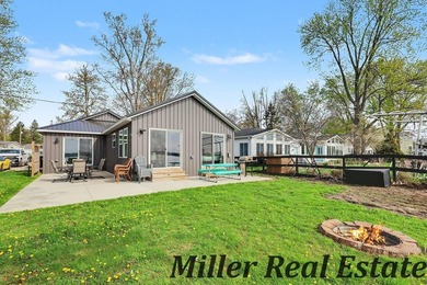 *Lake life done right* Gun Lake home tucked at the end of a - photo 12