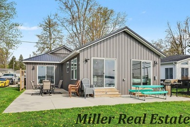 *Lake life done right* Gun Lake home tucked at the end of a - photo 13